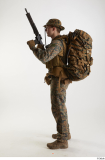 Casey Schneider Paratrooper Pose 4 loading gun standing whole body…